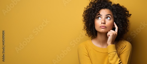 Worried confused Hispanic w...