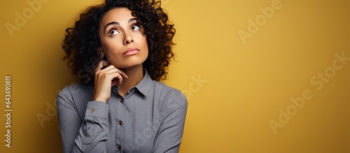 Worried confused Hispanic w...