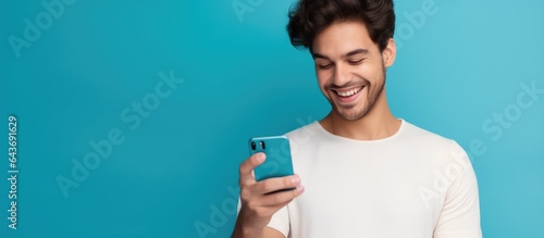 A young American man uses a...