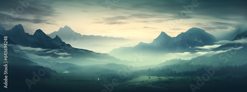 High definition blurry landscape with mountain on green grass at sunrise for background, backdrop © Andrey Tarakanov