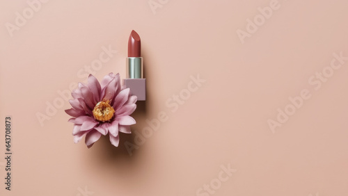 Composition of mauve lipstick and flowers for advertising cosmetic products, soft gradient background photo