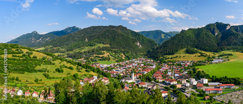 Terchova, mountain panorama of Mala Fatra National Park with a small village in the valley. View from the Terchovske srdce lookout tower, a tourist attraction on the hiking trail. photo