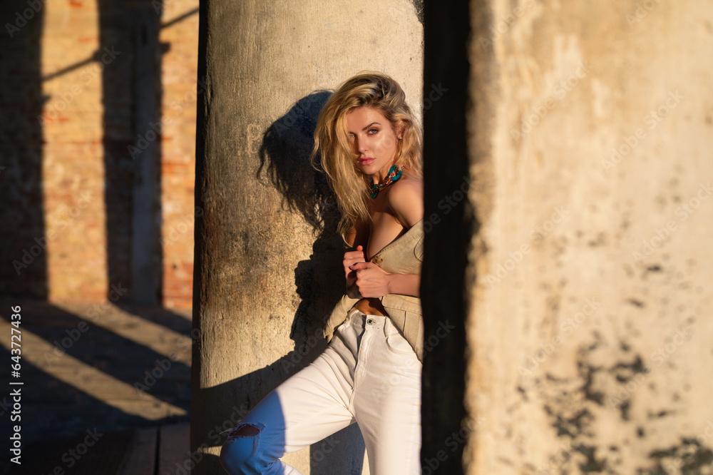 Fototapeta premium Fashion lifestyle. Beautiful sexy fashion woman. Fashions woman posing on street. Sexy model outdoors portrait. Fashion sexy trendy woman posing at city, summer street fashion. Beauty woman.