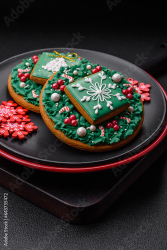 A beautiful Christmas composition consisting of ceramic plates, gingerbread and other elements