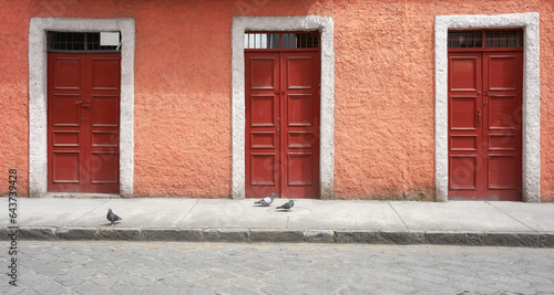 Street view of an old colonial building facade, Cuenca, Ecuador.