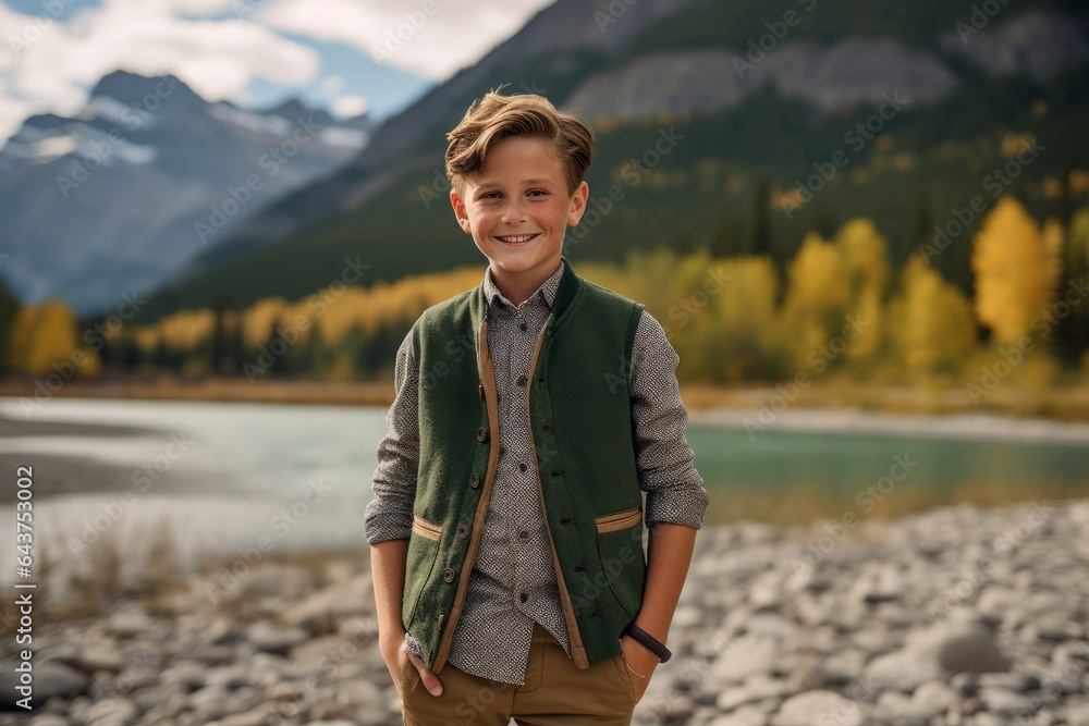 Environmental portrait photography of a grinning boy in his 30s wearing a chic cardigan at the banff national park in alberta canada. With generative AI technology Environmental portrait photography of a grinning boy in his 30s wearing a chic cardigan at the banff national park in alberta canada. With generative AI technology