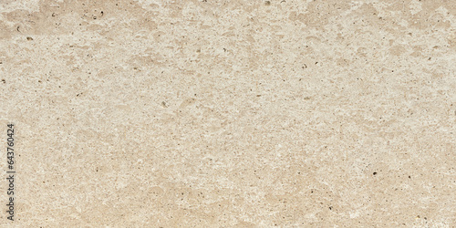 Natural travertine in beige color, background pattern. photo