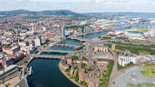 Aerial view on buildings and Lagan River in City center of Belfast Northern Ireland. Drone photo, high angle view of town photo