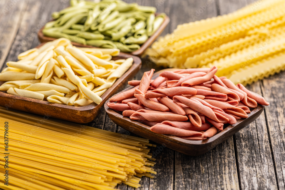 Fusilli pugliesi. Italian tricolor twisted pasta in bowl. Fusilli pugliesi. Italian tricolor twisted pasta in bowl.