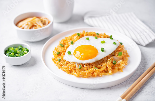 Kimchi fried rice with fried egg and scallion sprinkle