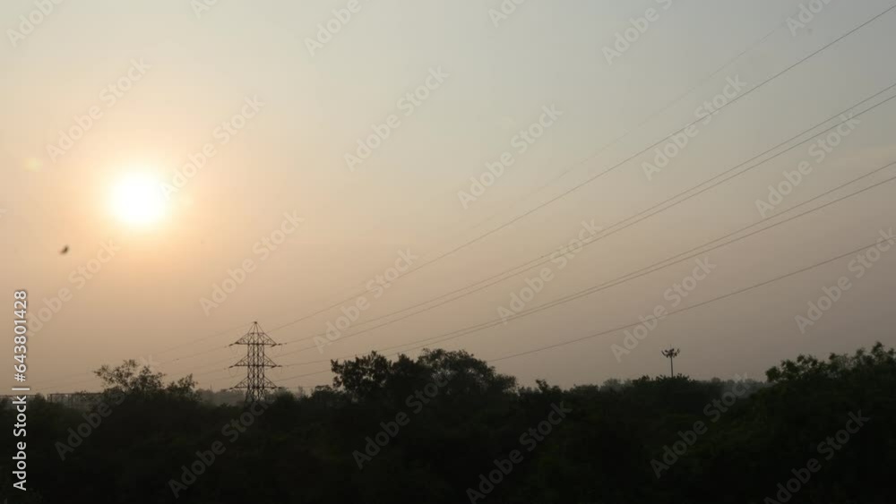 sunny day from a broken window pane. Shooting sun from a cracked windshield. city life, microwave stations, wires, connected, connection, development, developing country. sunny day from a broken window pane. Shooting sun from a cracked windshield. city life, microwave stations, wires, connected, connection, development, developing country.