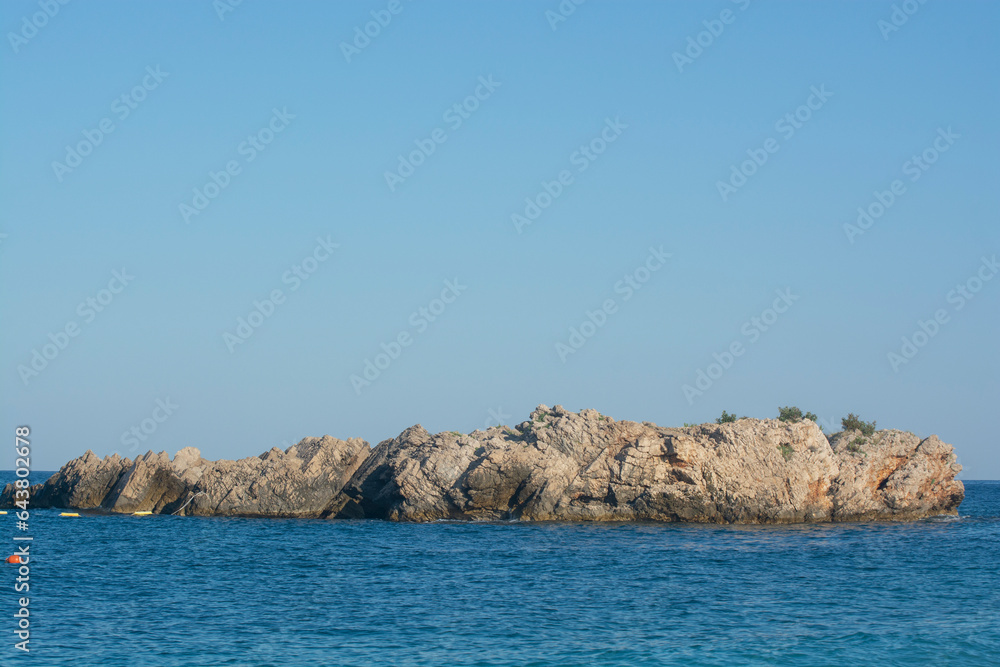 A small lonely island in the blue sea