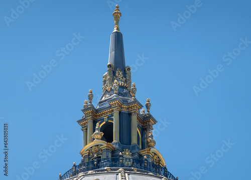 Photography San Francisco, CA, USA - July 12, 2023: Gray stone NE City Hall dome tip closeup under blue sky