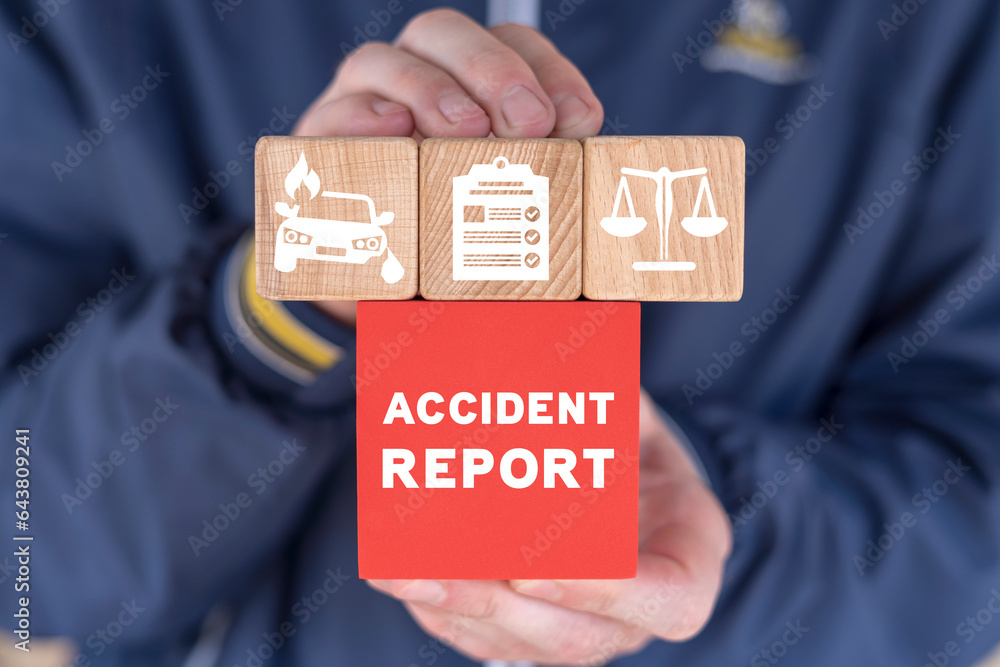 businessman-holding-colorful-blocks-and-sees-inscription-accident