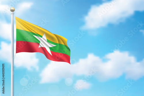 Waving flag of Myanmar on sky background. Template for independence