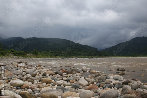 Water flows through mountain river 