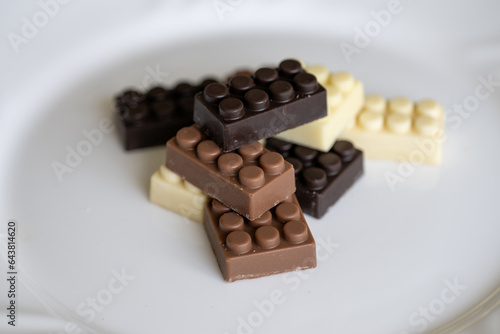 Bars of chocolate in the shape of blocks.