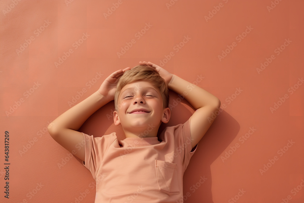 a young boy lies on ground while smiling, in the style of minimalist backgrounds, terracotta, babycore, a young boy lies on ground while smiling, in the style of minimalist backgrounds, terracotta, babycore,