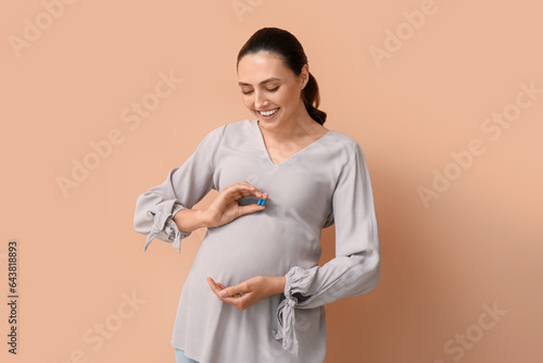Young pregnant woman with F...