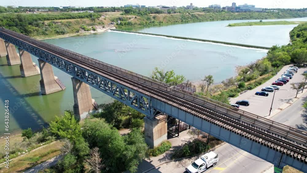 Aerial video of City Park, Saskatoon, SK, revealing its vibrant streets, urban green spaces, and historic architecture. A blend of city life and nature, ideal for urban exploration. Aerial video of City Park, Saskatoon, SK, revealing its vibrant streets, urban green spaces, and historic architecture. A blend of city life and nature, ideal for urban exploration.