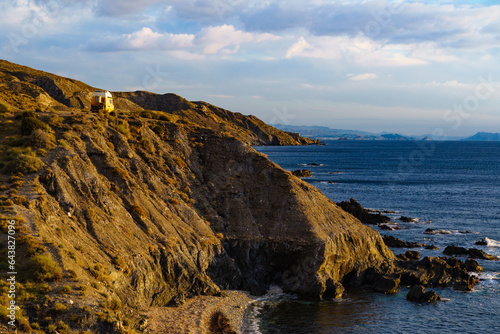 Camper van on coast cliff in Spain. photo