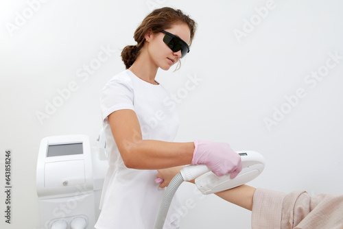 Embracing modern beauty: woman at salon for laser arm hair removal