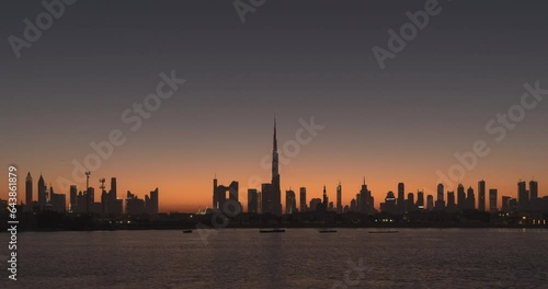 4K Timelapse - City Skyline and cityscape at sunrise in Dubai UAE.