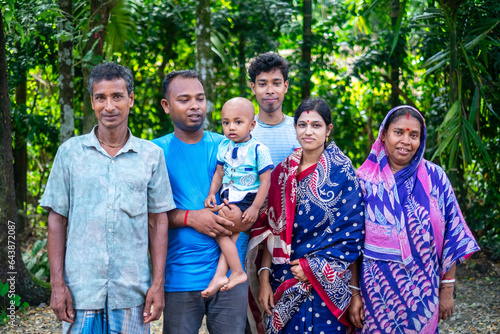 Portrait of a south asian rural family in a park 