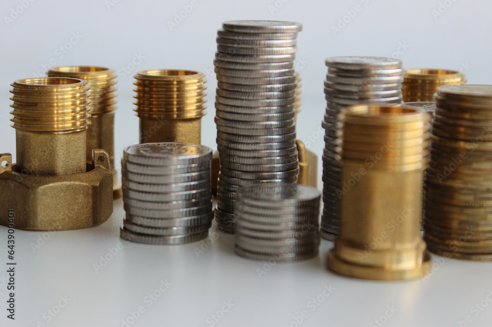 Sanitary And Plumbing Accessories Shop. Fittings And Connection Nuts Near Columns Of Coins Isolated Stock Photo
Sanitary And Plumbing Accessories Shop. Fittings And Connection Nuts Near Columns Of Coins Isolated Stock Photo