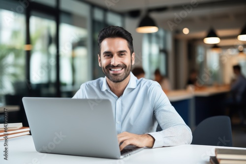 Handsome Latin Businessman Working with Computer, Male Manager Works in Modern Office, Analysis Data Statistics and Business Planning.