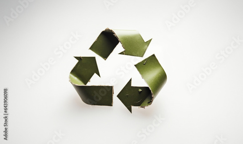 Recycle symbol made of green paper