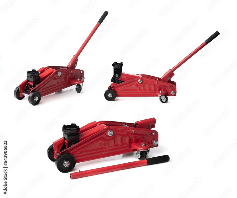 Red hydraulic floor jack isolated on white background Red hydraulic floor jack isolated on white background