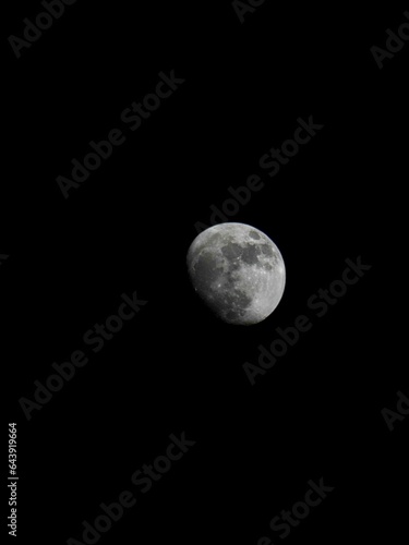 Half moon with dark clouds in the night. Perfect sky behind some dark tones clouds with moon in shot. Stock Photos. Background, Desktop wallpaper