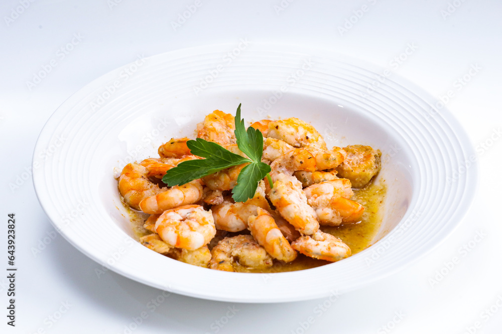 prawns with parsley with white plate prawns with parsley with white plate