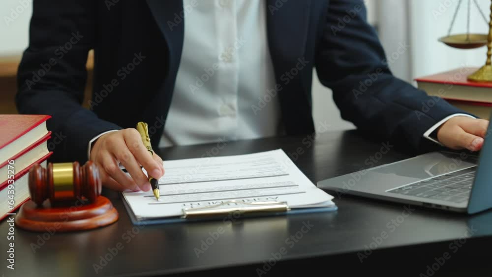 Legal consultant and real estate attorney lawyer read the building lease contract signing agreement for local business. Legal consultant and real estate attorney lawyer read the building lease contract signing agreement for local business.
