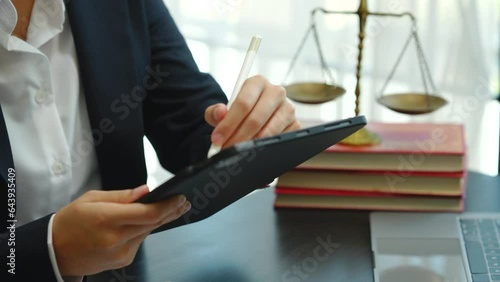 Legal consultant and real estate attorney lawyer read the building lease contract signing agreement for local business.