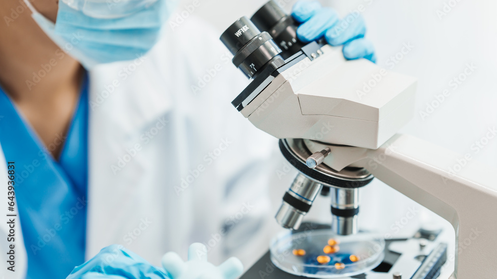 Close up scientist conducting precise virus lab test, scientific methodology, microbiologist conducting virus detection and testing in progress Close up scientist conducting precise virus lab test, scientific methodology, microbiologist conducting virus detection and testing in progress