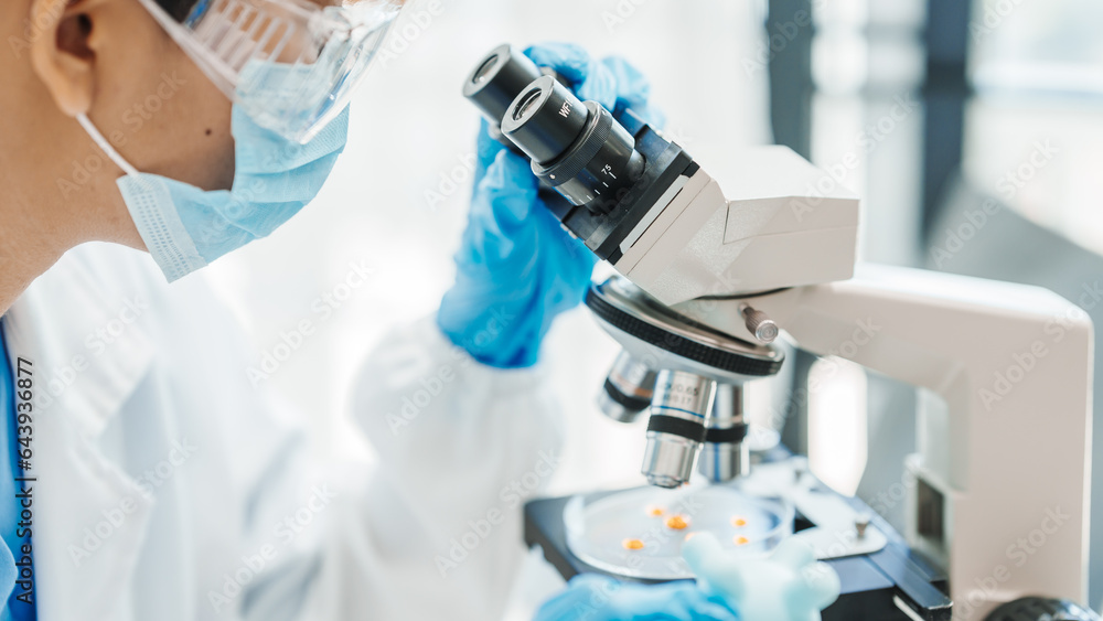 Close up scientist conducting precise virus lab test, scientific methodology, microbiologist conducting virus detection and testing in progress Close up scientist conducting precise virus lab test, scientific methodology, microbiologist conducting virus detection and testing in progress