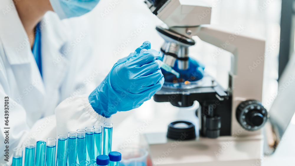 Close up scientist conducting precise virus lab test, scientific methodology, microbiologist conducting virus detection and testing in progress Close up scientist conducting precise virus lab test, scientific methodology, microbiologist conducting virus detection and testing in progress