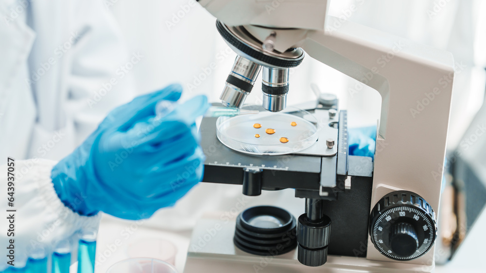 Close up scientist conducting precise virus lab test, scientific methodology, microbiologist conducting virus detection and testing in progress Close up scientist conducting precise virus lab test, scientific methodology, microbiologist conducting virus detection and testing in progress
