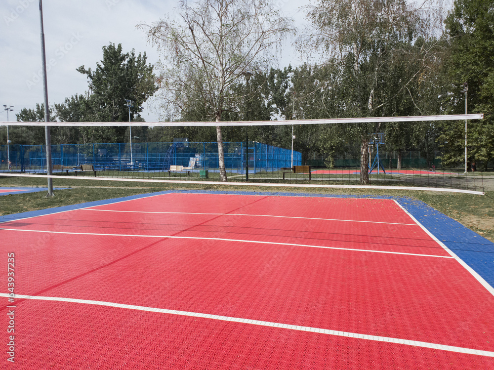 Public modern empty volleyball court.