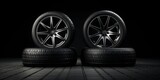 New Car Wheels on the Left Side of the Image, Set Against a Sleek Black Background, Showcasing Modern Design and Automotive Excellence