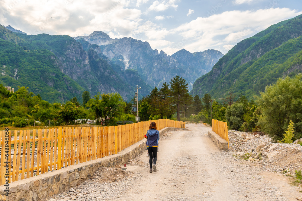 Walking along the trail in the valley of Theth national park, Albania. Albanian Alps