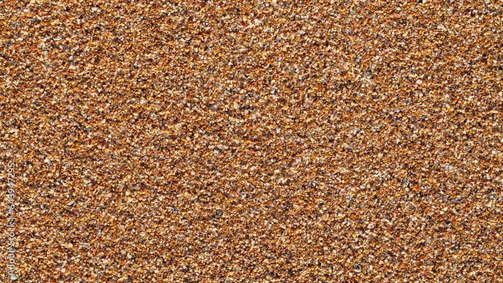 Beach sand rotating, turning, close-up macro, top view
Beach sand rotating, turning, close-up macro, top view