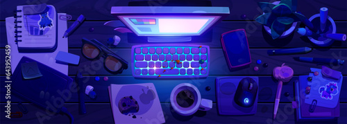 Top view of wooden messy work table at night. Cartoon vector of workspace with light from screen, tablet and notebook, sticky notes, cookie crumbs on keyboard, coffee spills on desk, phone and glasses