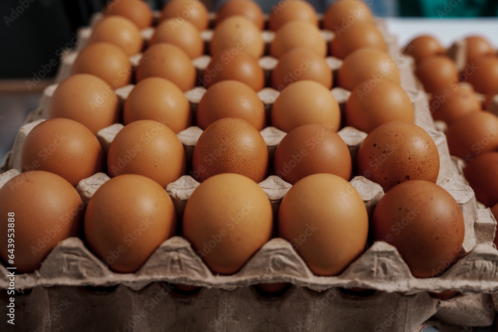Farm fresh chicken eggs on paper egg box from organic farm., no people, nobody. Farm fresh chicken eggs on paper egg box from organic farm., no people, nobody.