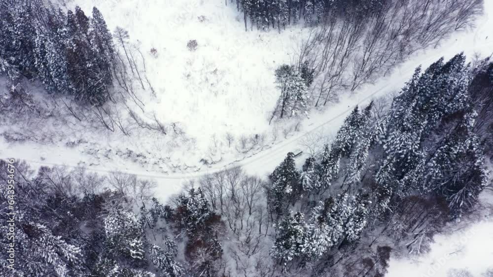 Drone Aerial view of Driving car with snow tires on local road in the ...
