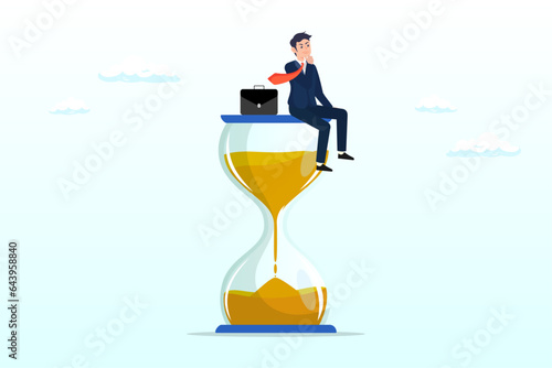 Depressed businessman sitting on time passing sand glass or hourglass, wasting time waiting and never start new business, time fly or ineffective thinking or laziness (Vector)
