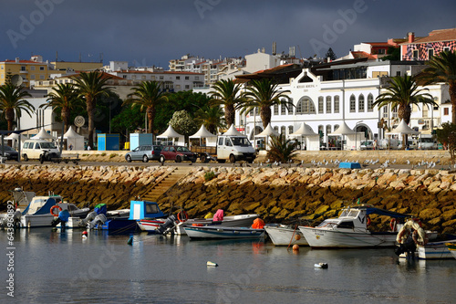 Lagos, Faro, Algarve, Portugal, Europe - Bensafrim river and Avenue of Discoverers - main promenade in the city center, in background building of Municipal Market in historic part of town