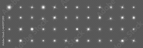 Glare set. Flashes of rays of light. The effect of glow, radiance, shine. Collection of various glowing sparks, stars. On a transparent background.